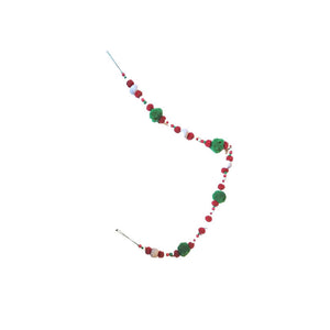Multi coloured pom pom garland wiht white, gree and red pom poms and wooden beads throughout