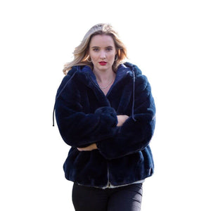 The one size navy blue faux fur coat with hood as worn on a model