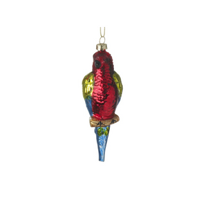 The red bird tree decoration with yellow-green and turquoise wings