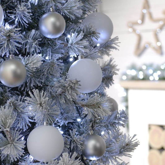 Showing the 1000 cold white LED string Christmas lights on the Christmas