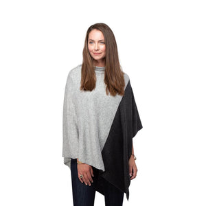 Silver grey and charcoal grey cashmere poncho as worn on a model