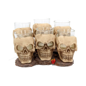 Skull shaped shot glasses showing on the rocky place set holders