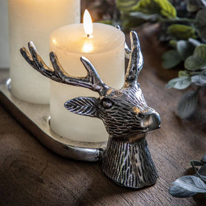 Showing a close up of the head on the stag head candle holder