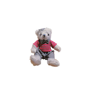 Teddy bear wearing cap, red and grey striped jumper and beige 3/4 cropped shorts